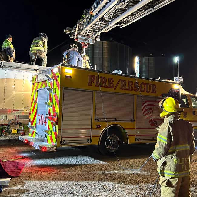 Wild Rose Area Fire District fleet and fire department firefighter practice and exorcise a trapped man in corn scenario